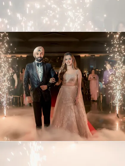 Simran and Sanjit make a grand entrance through a path of sparklers and smoke, creating a dreamy and cinematic start to their celebration.