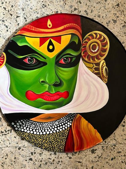This Kathakali portrait focuses on the expressive eyes and intricate makeup of the dancer. The artwork aims to capture the dramatic and spiritual essence of the performance.