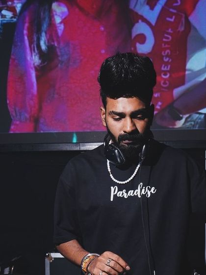 A focused moment at Hyper Club, Raipur, with my headphones on, cueing up the next banger.