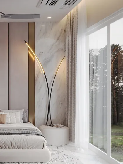 This shot highlights a unique, sculptural floor lamp, rendered to show its delicate form and the warm light it casts. The large window connects the serene interior to the natural world outside.