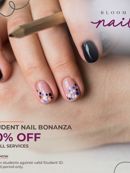 A fun and creative look with short black nails and a confetti-style glitter accent on a nude base.