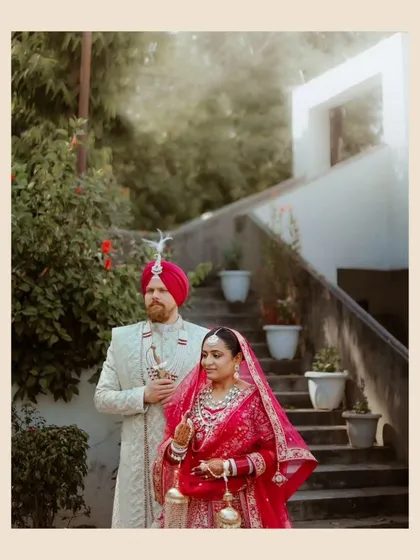 A beautiful portrait of the couple, with a soft, hazy light that gives the image a dreamy and ethereal quality.