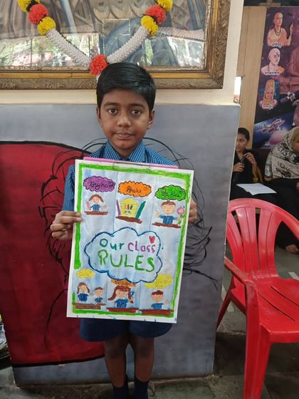 This student created a colorful poster of "Our Class Rules." Art can be a powerful tool for communication and expression.