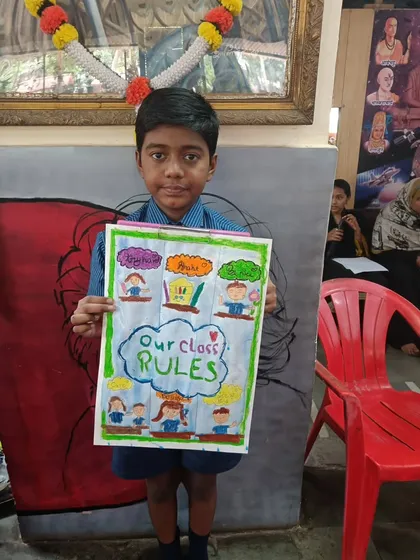 This student created a colorful poster of "Our Class Rules." Art can be a powerful tool for communication and expression.