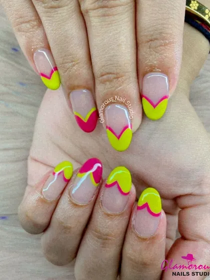 Who says French manicures have to be boring? We gave this classic a modern twist with vibrant neon yellow and hot pink in a sharp V-shape. It's a fun, playful look that’s perfect for making a statement.