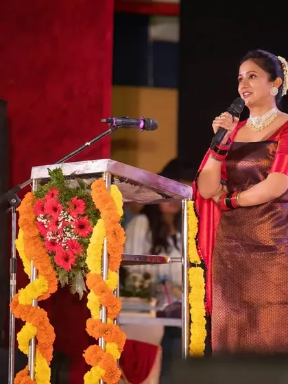 A speaker engages with the audience during the 'Kasinasara' event. Our photographers move discreetly to capture various angles without disrupting the flow of the event.