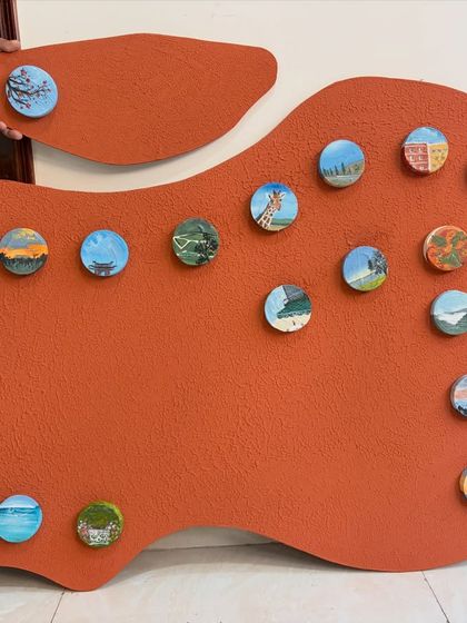 The finished "Our Memories" piece, a large-scale installation that is deeply personal to the clients. This is a perfect example of how we can collaborate to create meaningful art for your home.