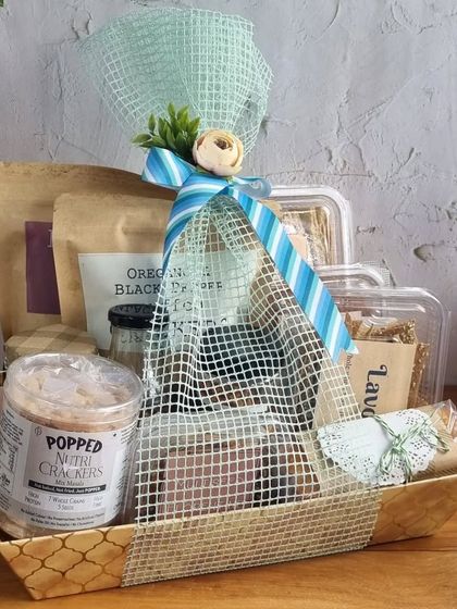 A simple and rustic hamper for Dad, featuring a variety of our savoury snacks in a natural-fibre tray.