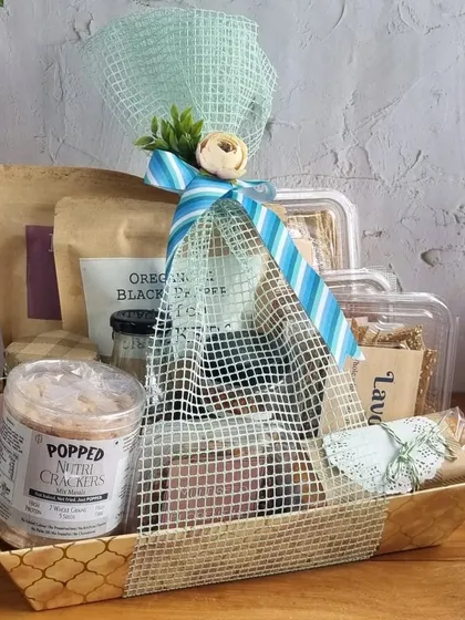 A simple and rustic hamper for Dad, featuring a variety of our savoury snacks in a natural-fibre tray.