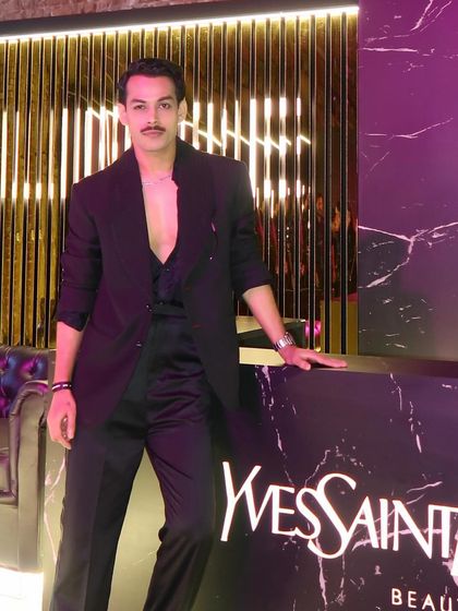 Giri Sawalkar in a full-length shot, showcasing the modern elegance of his SGM suit. The clean lines and luxurious fabric create a look of understated sophistication.