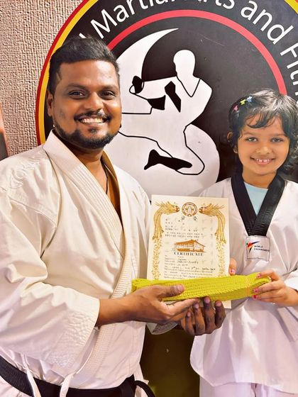 National Martial Arts and Fitness Academy - Kids Martial Arts & Fitness The Journey of Discipline: Belt Graduations photo 8