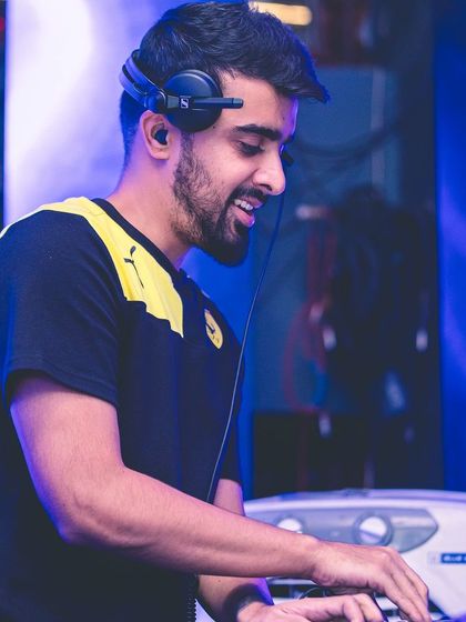 A close-up shot of me mixing, even while feeling under the weather. The music and the crowd's energy are the best medicine.