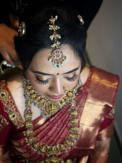 A high-angle shot showcasing the matha patti and the beautiful winged eyeliner.