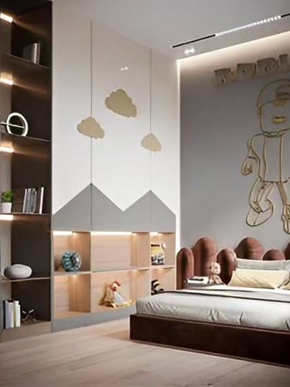 A modern and cool kids' room with a Roblox-themed wall feature. The design uses a sophisticated color palette and includes unique cloud-shaped pendant lights and built-in shelving.