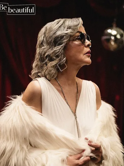 Channeling a retro disco vibe for the Be Beautiful editorial. The combination of the white dress, faux fur, and disco ball created a glamorous, nostalgic look.