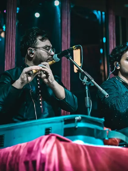 The soulful sound of the flute adds a layer of mystical beauty to our music. Here is our flutist, adding his melodic touch to a performance.