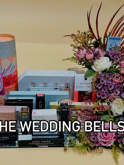 A stunning display of cosmetics for a bridal trousseau. We arrange all the products on a mirror tray with a beautiful floral arrangement.