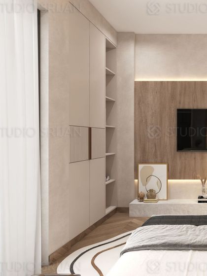 This angle highlights the clever wardrobe design, which combines closed cabinets with open, decorative shelving.