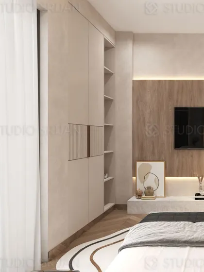 This angle highlights the clever wardrobe design, which combines closed cabinets with open, decorative shelving.