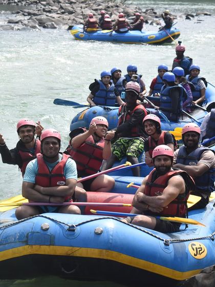 A group of friends on their raft, ready for adventure in Dandeli. These trips are perfect for groups looking for a high-energy weekend.
