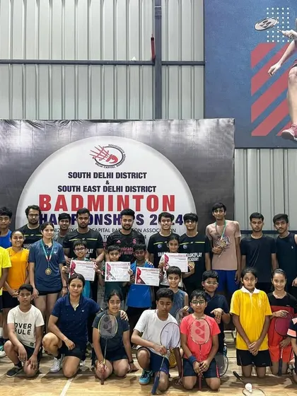 The whole team of winners from the Delhi District Badminton Championship. I foster a supportive team environment where players motivate each other to succeed.