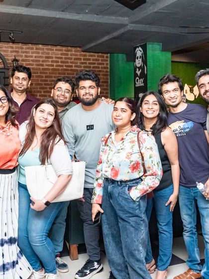 A large group of friends gathered for a celebration.