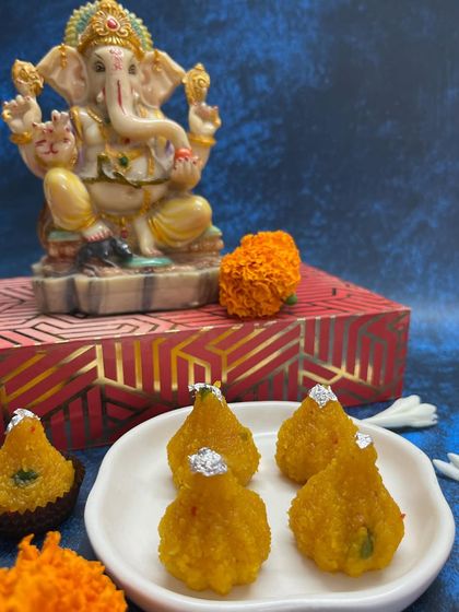 Another look at my motichoor modaks, this time decorated with a piece of edible silver leaf (vark) for a traditional festive touch.