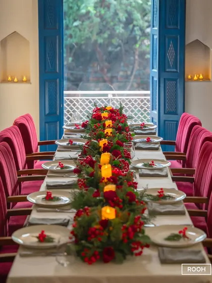 I design spaces for connection and celebration. This long table, set for a festive gathering, shows how our elegant interiors can be transformed for your special group events and private dining.