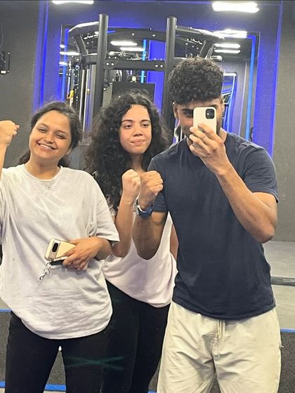 A quick post-workout selfie to celebrate the gains. The energy and camaraderie here are contagious.