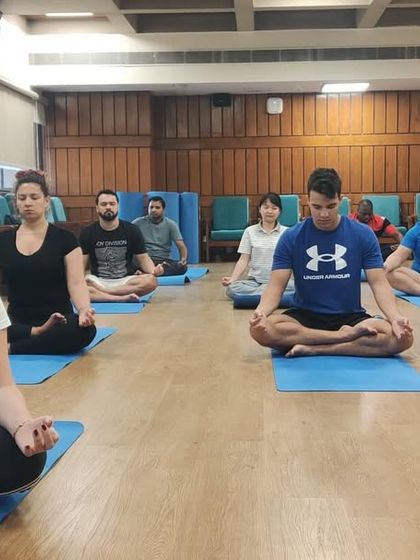 Students from 13 different countries participating in our February Teacher Training batch in Noida. This image captures the focused energy of a group meditation session.