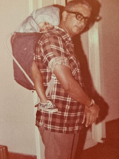 A heartwarming photo of Dara Mistry carrying his young daughter in a backpack carrier. For many of us, the love for the outdoors is a family affair.