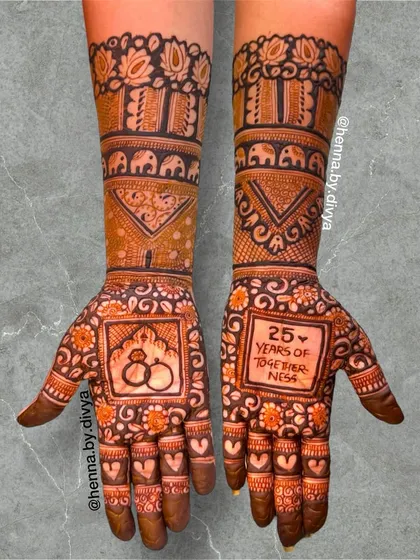 Celebrating '25 Years of Togetherness' with this special anniversary design. It includes the engagement ring symbol and is filled with hearts and traditional elephant patterns.