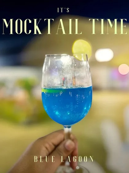 My Blue Lagoon mocktail is like a tropical vacation in a glass. The vibrant blue colour and tangy lemonade flavour make it a visually stunning and refreshing non alcoholic drink for any party.