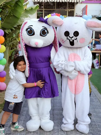 A warm hug for our friendly bunny mascot, Suzy. Our characters love interacting with the children and making their day special.