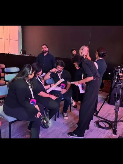 A huddle with the team backstage at the TEDx Global Idea Search. We constantly communicate to stay ahead of any potential issues and ensure a smooth show.