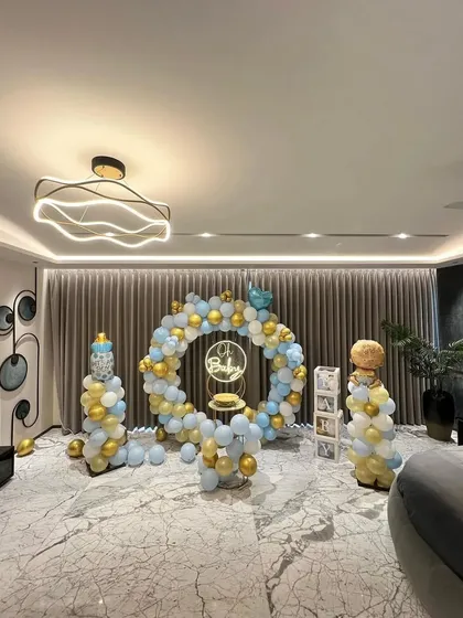 A full view of the "Oh Baby" balloon ring setup in a spacious, modern home.