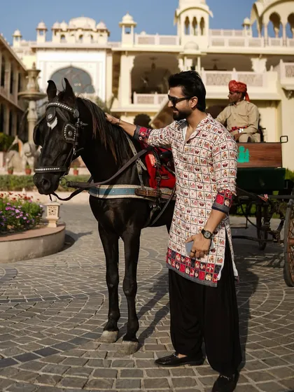 Posing with my new friend, Majnu the horse.