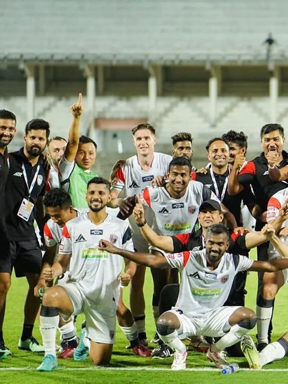 Another shot of the team's celebration after reaching the semi-finals. The energy and unity are clear to see.