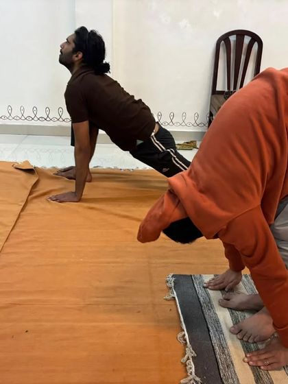 The flow of movement in Surya Kriya, connecting one posture to the next with the rhythm of the breath.