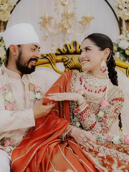 A playful, candid moment between a Sikh couple at ITC Dwarka. It’s these lighthearted interactions, the shared glances and smiles, that I believe are the soul of a wedding album.