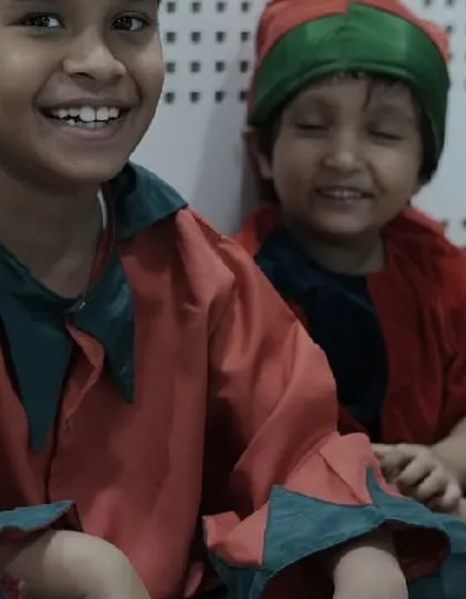 Pure happiness on the faces of our young elves backstage. The joy of creating and performing together is what it's all about.