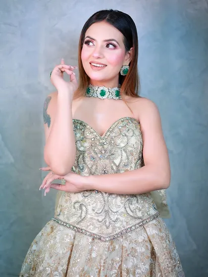 A candid and happy pose that adds a touch of spontaneity to this glamorous gown shoot.