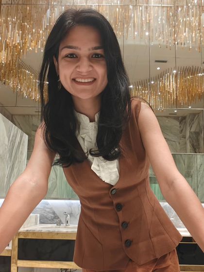 A selfie from the day I spoke at the conference. It was a moment of embodying my journey, standing proudly as an artist who was once a doctor, and showing that reinvention is powerful.