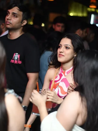 Candid moments from the crowd, showing people enjoying the atmosphere.