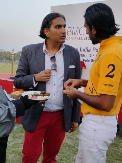 Discussing our menu with Maharaja Sawai Padmanabh Singh of Jaipur at the polo grounds. We tailor our offerings to suit the sophisticated palate of our elite clientele.