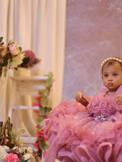 Explore our various floral and elegant setups. These sets feature props like swings, ornate chairs, and pearl decorations, all surrounded by beautiful flowers for a timeless and pretty photoshoot.