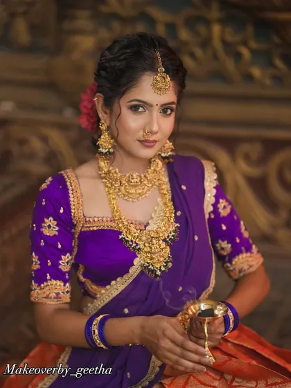 A portrait of timeless elegance. This professional shoot features one of our grandest temple jewellery sets, showcasing the intricate details of the choker, long necklace, and vaddanam (waist belt). This is the kind of heritage look we love to curate.