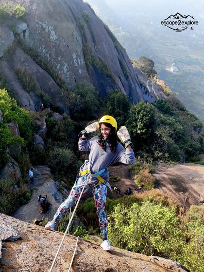 Pure joy and excitement captured during a rappelling session.