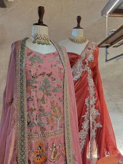 This display showcases the artistry of Jaya Rathore. I love the pink suit with its unique figural embroidery, telling a story through threadwork.