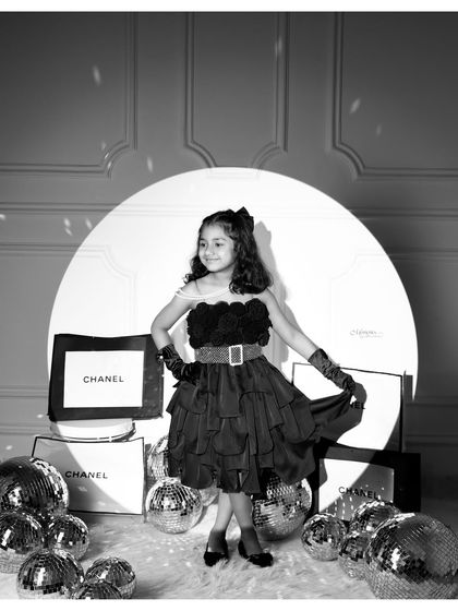 Another angle from our fun, high-fashion toddler shoot. It's all about letting them lead and capturing the magic in their world.